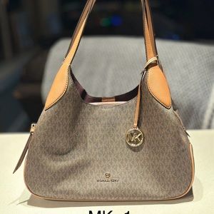 Michael Kors handbag. Used once. Excellent condition.